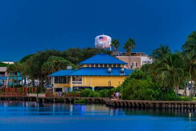 Stuart Water-Tower in the background. View of the river boardwalk and Mulligans Restaurant in downtown Stuart-Florida.